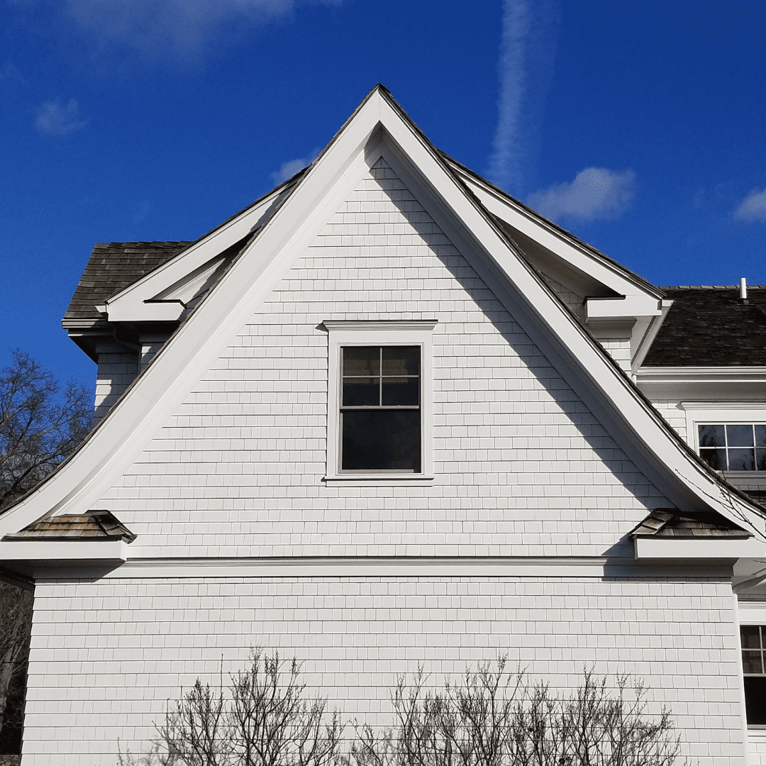 exterior of home with window by Raymond Design Builders in Fairfield County, CT