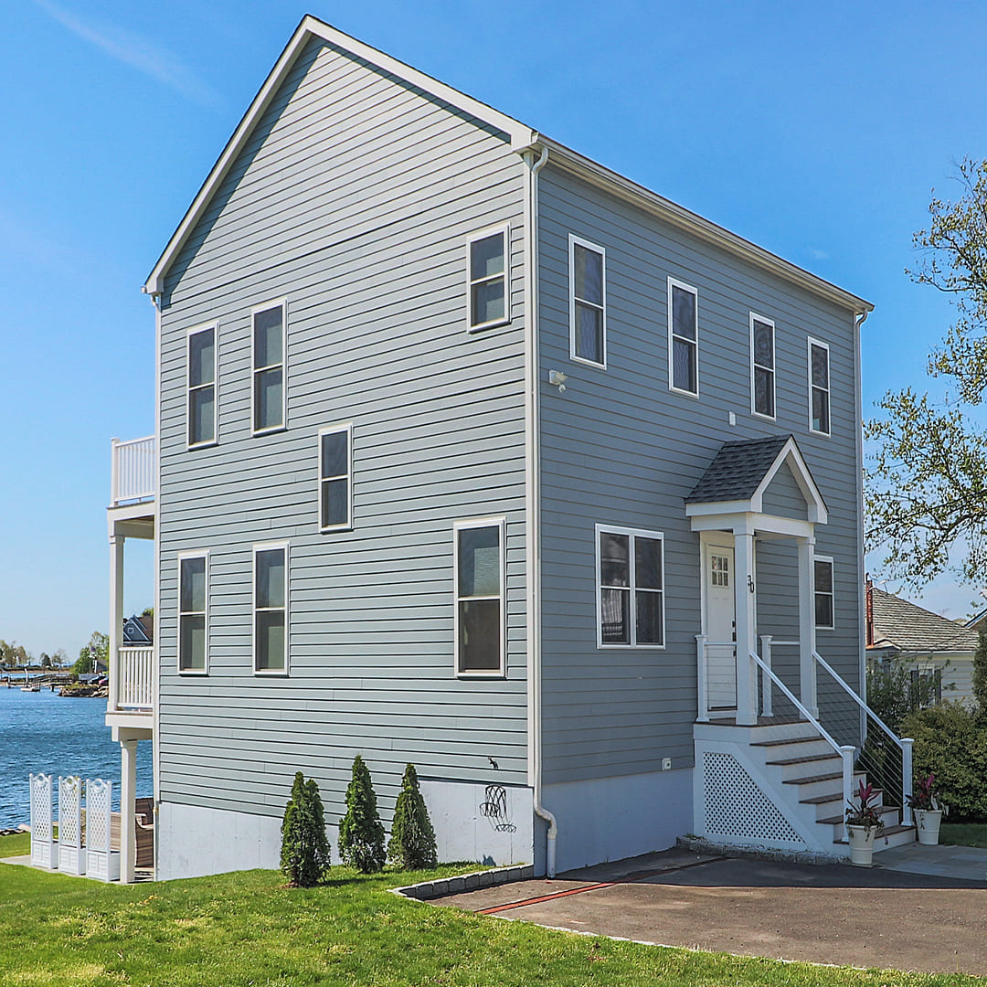 house on the water by Raymond Design Builders in Fairfield County, CT
