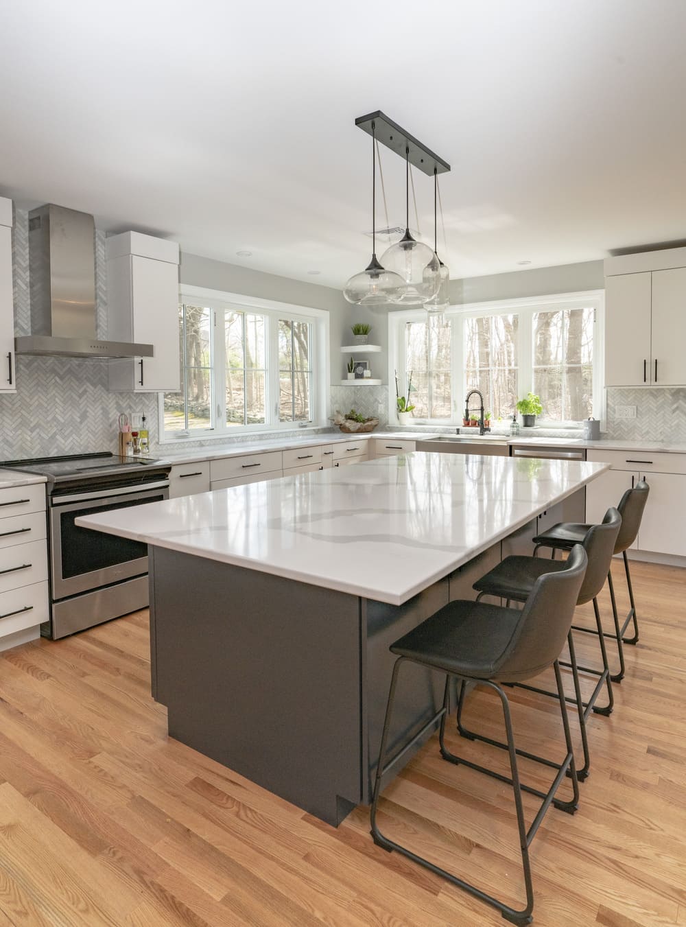 white kitchen island in new kitchen by raymond