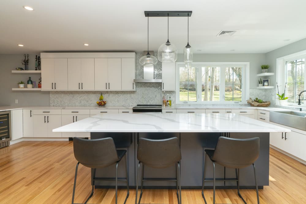 white marble kitchen island by raymond design builders in ct